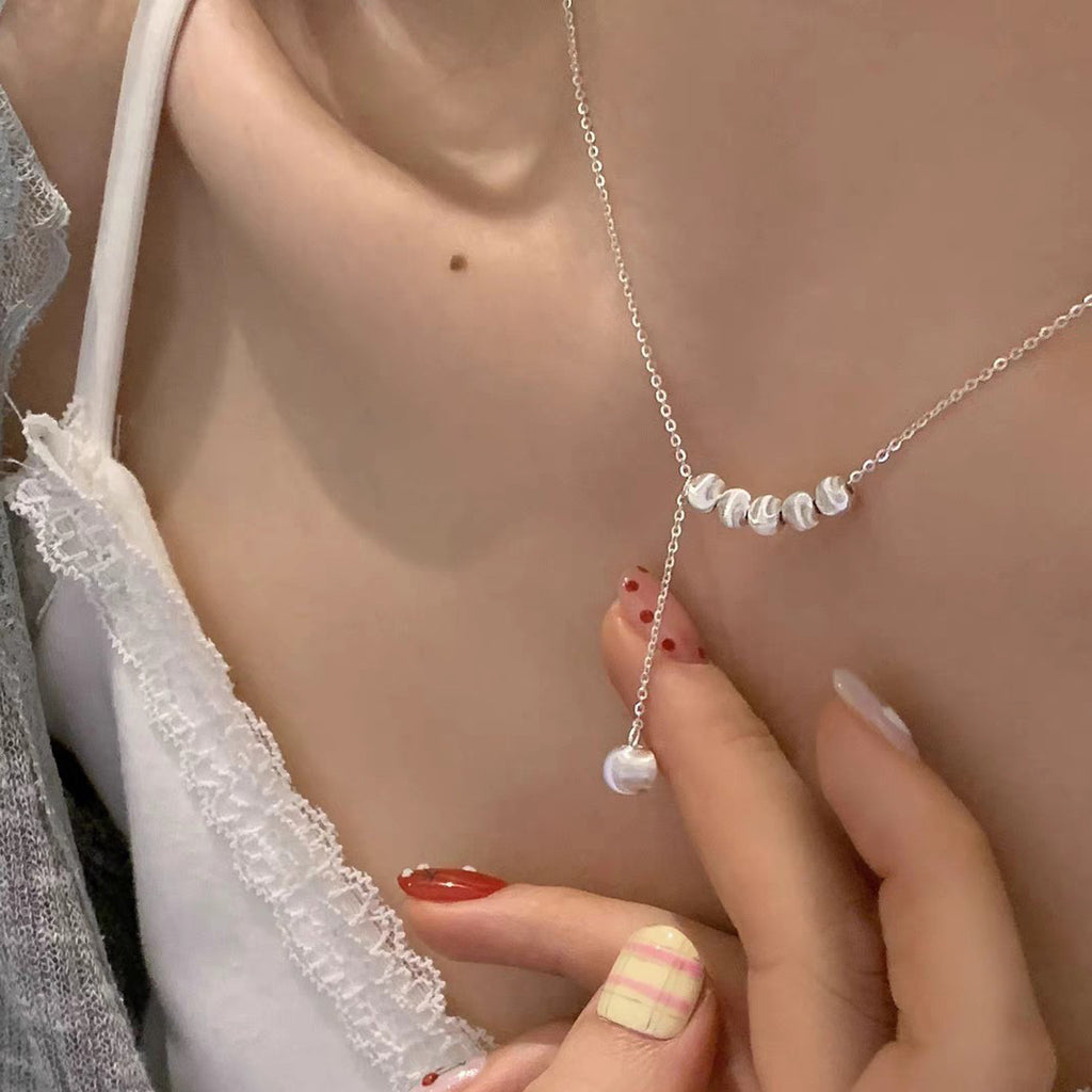 Collana regolabile con nappina e perline spazzolate in argento sterling 999