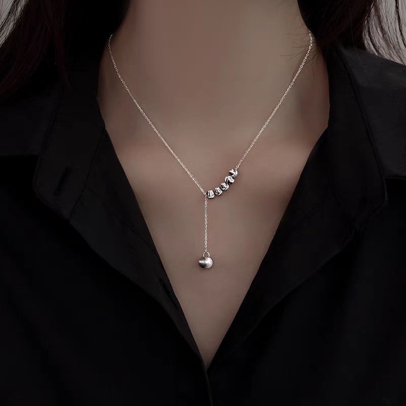 Collana regolabile con nappina e perline spazzolate in argento sterling 999