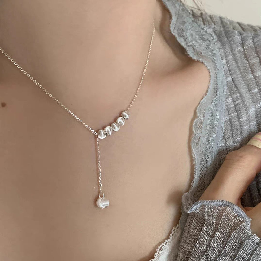 Collana regolabile con nappina e perline spazzolate in argento sterling 999