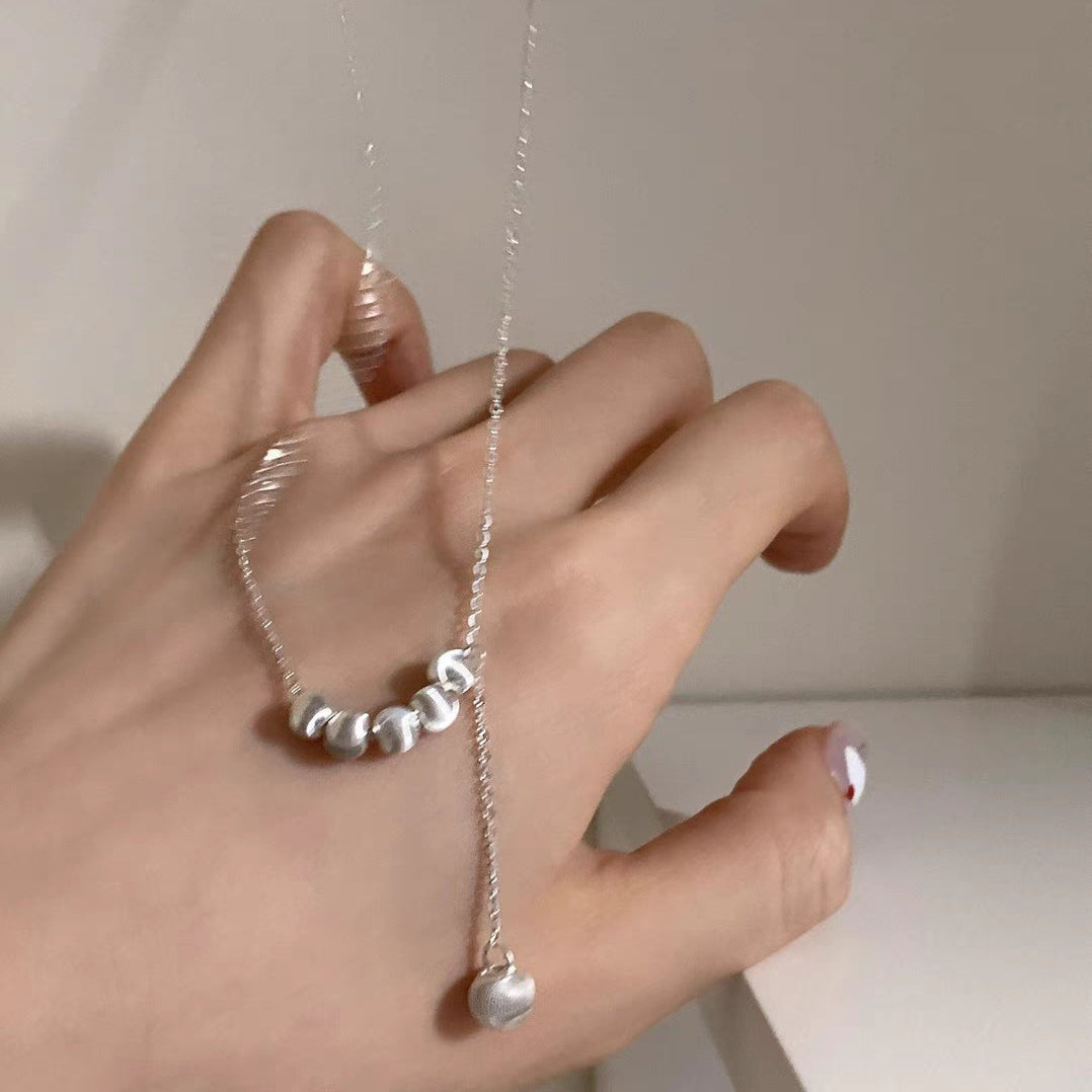 Collana regolabile con nappina e perline spazzolate in argento sterling 999
