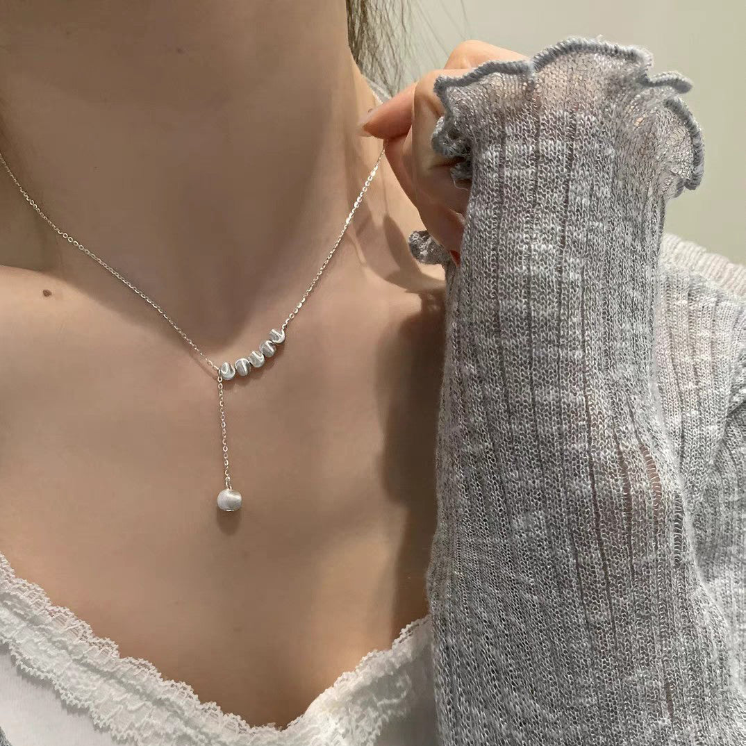 Collana regolabile con nappina e perline spazzolate in argento sterling 999